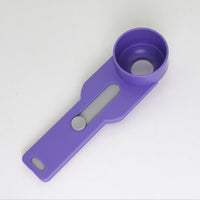 Practical and compact coffee scoop funnel with sliding measuring function