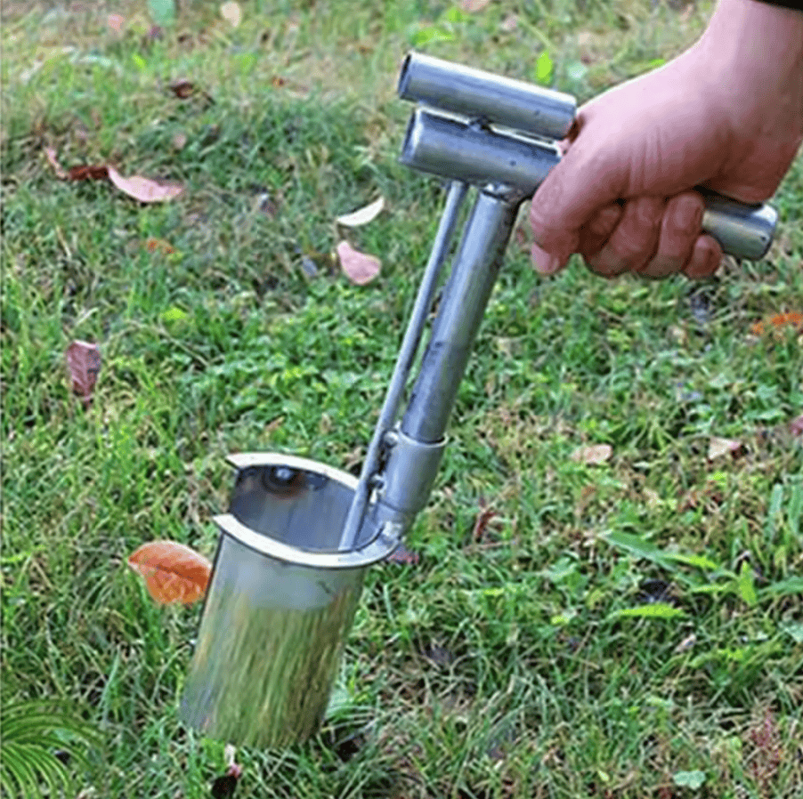 Hand held seedling transplanter
