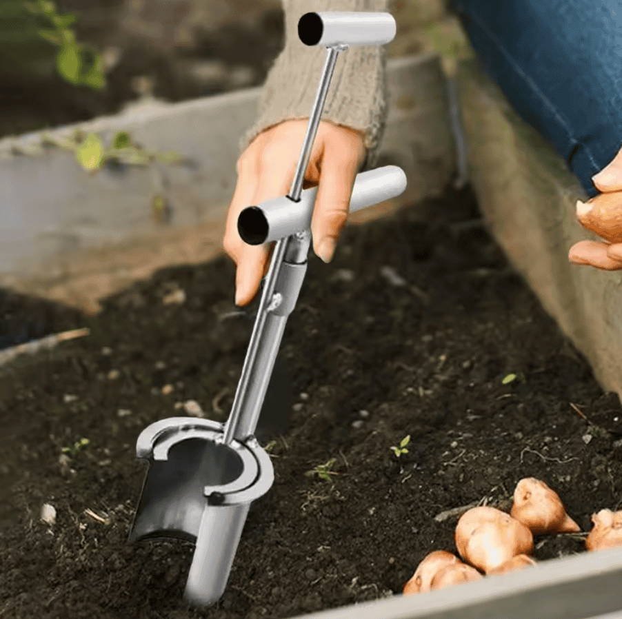 Hand held seedling transplanter